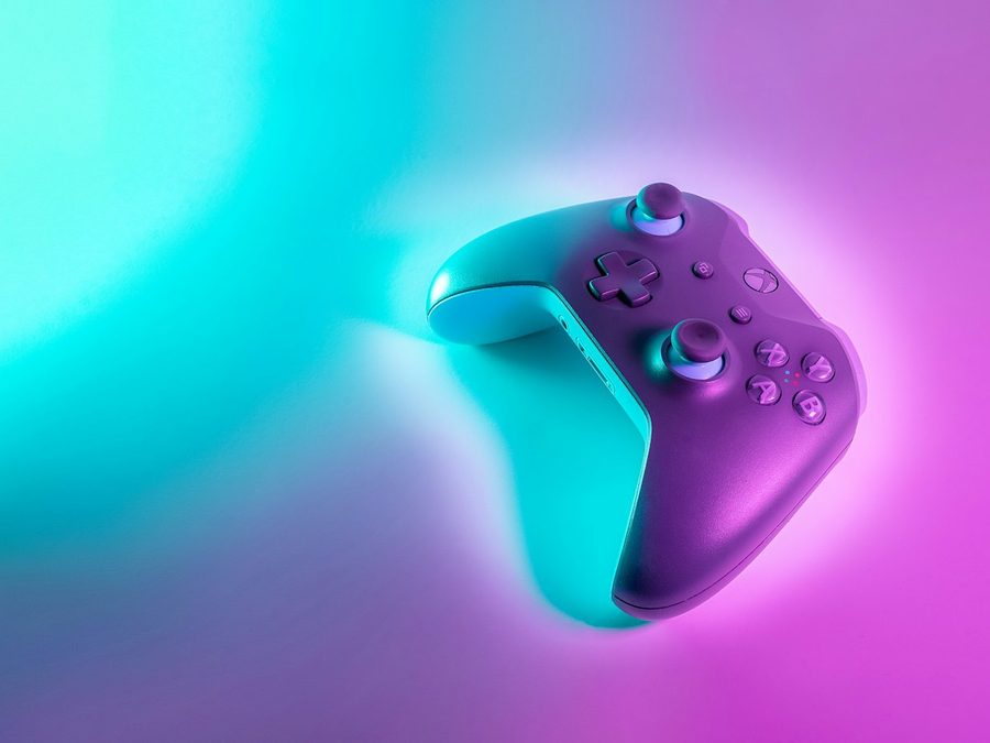 Aurora Pro wireless controller under purple and teal light