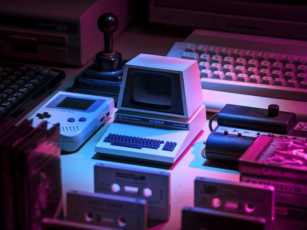 Retro computers under neon light